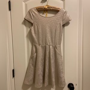 Blush and gold shimmer cocktail dress.